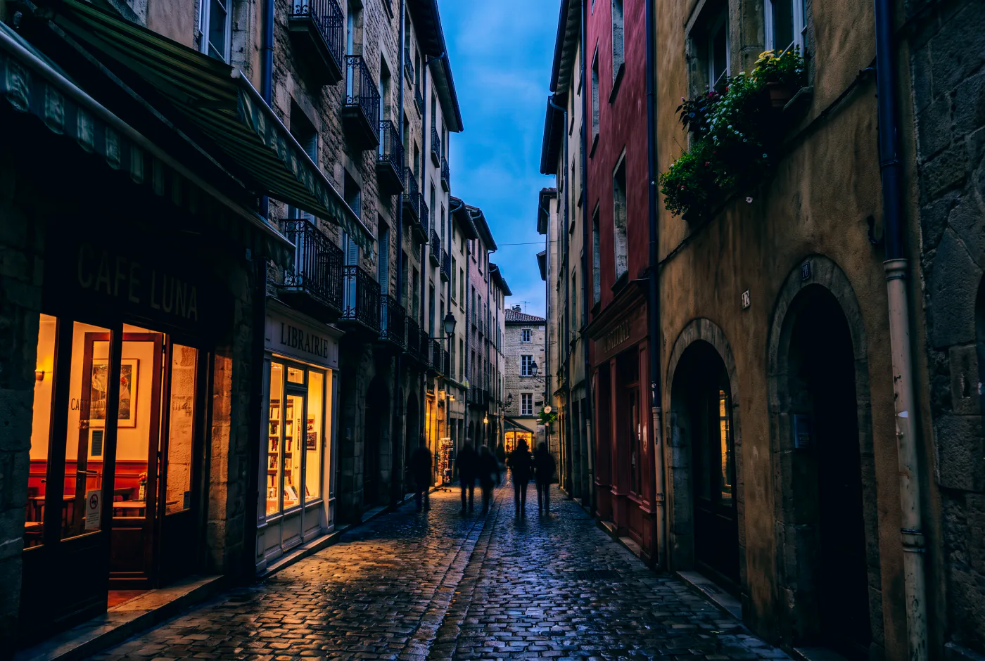 A narrow old town street at dusk, rendered by Lightbox with the Neon Rain preset applied